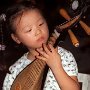 China-Girl playing mandolin