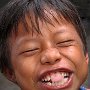 Peru - Iquitos -Boy chewing gum 