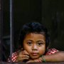 Siem Reap Cambodian girl in window
