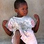 Tanzania - Tarangire - Maasi girl with toy