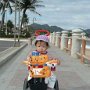 Vietnam - Nha- Trang- Boy on - bike at beach